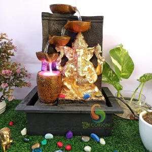 DECORION™ Diya Ganesh (Brown Stone) Decorative Table Top Water Fountain for Home Décor/Office/Indoor & Outdoor/Garden/Puja Room/Vaastu with Multicolor LED Light and Adjustable Water Pump